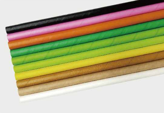 Solid-color paper straws in black, pink, orange, green, yellow, brown, and white