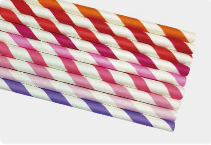 Paper straws with white base and orange, red, pink, and purple candy stripes